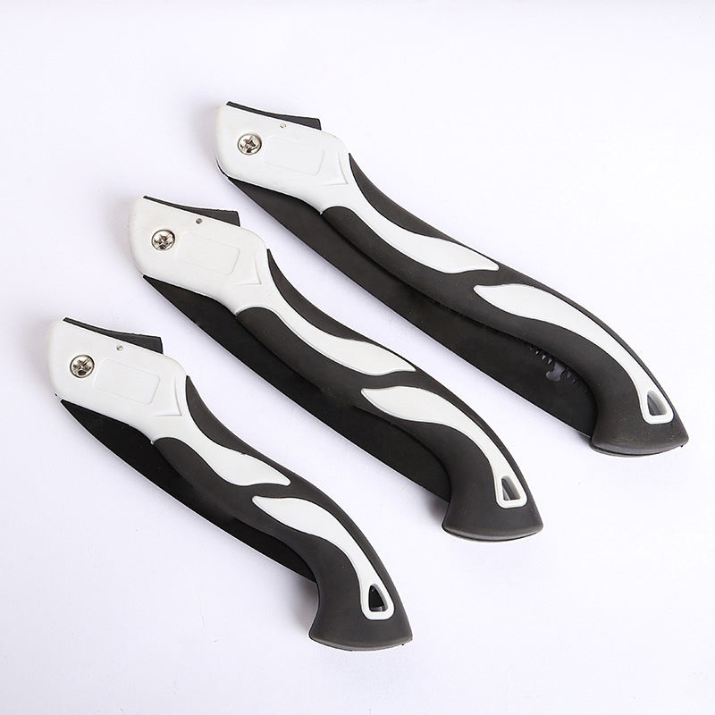 Small handheld folding saw for cutting, ideal for carpentry work