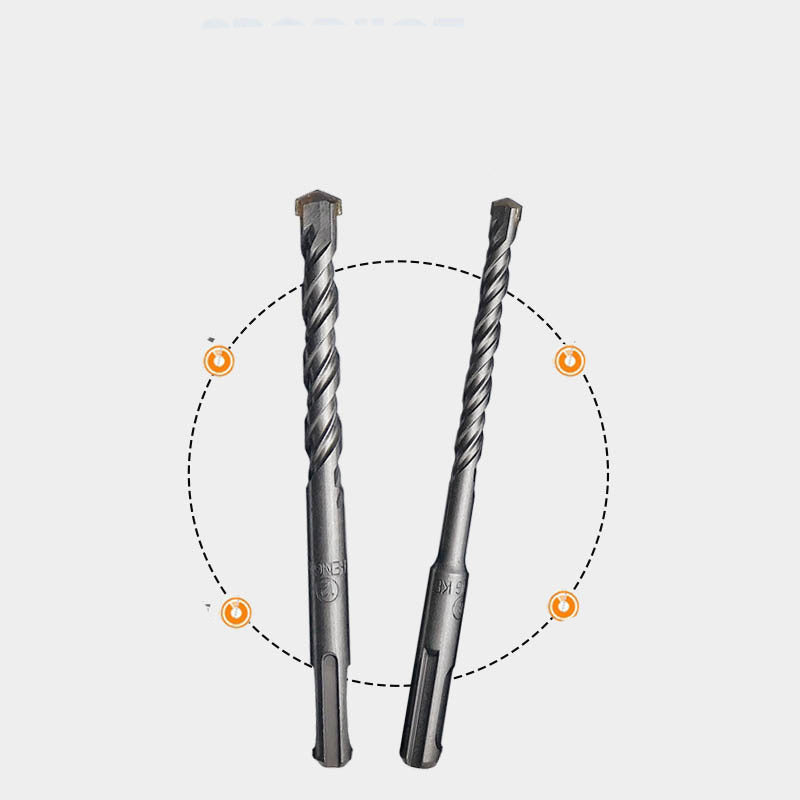 Two-groove, two-slot round shank hammer drill bit for enlarging holes in cement concrete through walls.