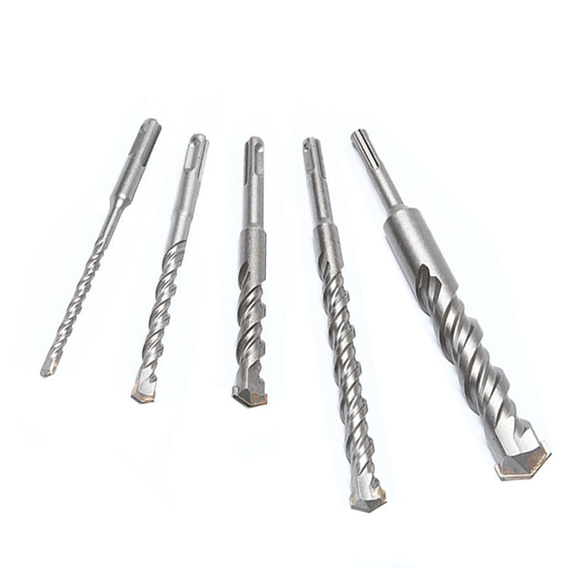Two-groove, two-slot round shank hammer drill bit for enlarging holes in cement concrete through walls.